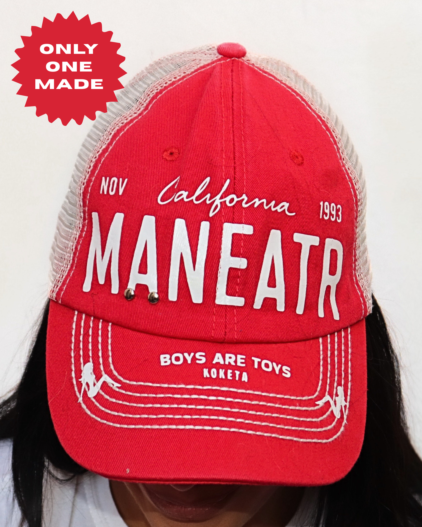 MANEATER License Trucker Hat