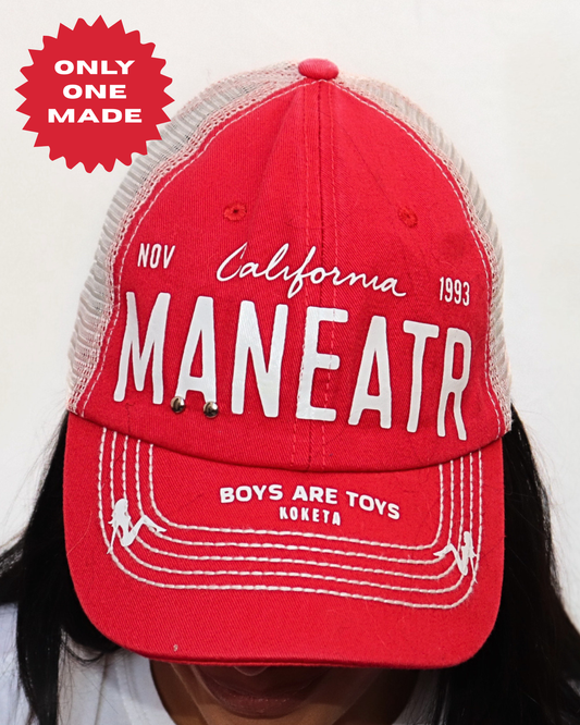 MANEATER License Trucker Hat